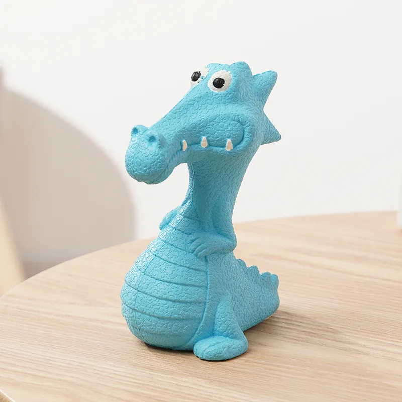Jouet de chien à son dinosaure